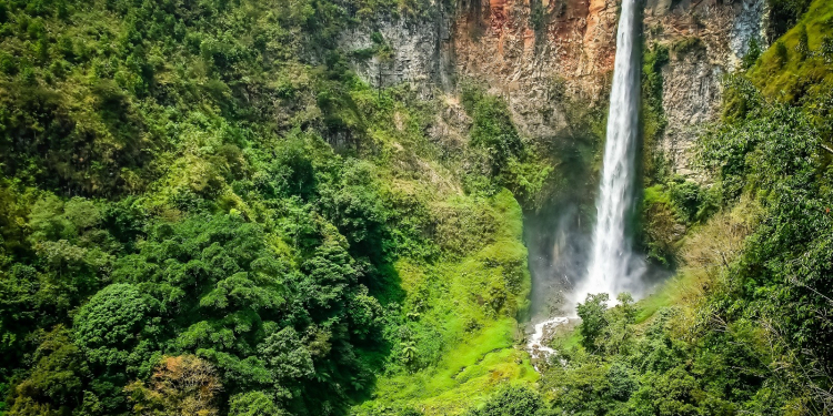 Powerful Sipisu Pisu waterfall in northern Sumatra Indonesia