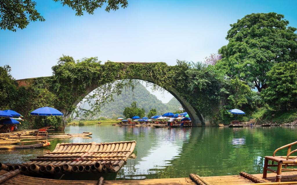 old stone arch bridge in yulong river ,yangshuo,China.