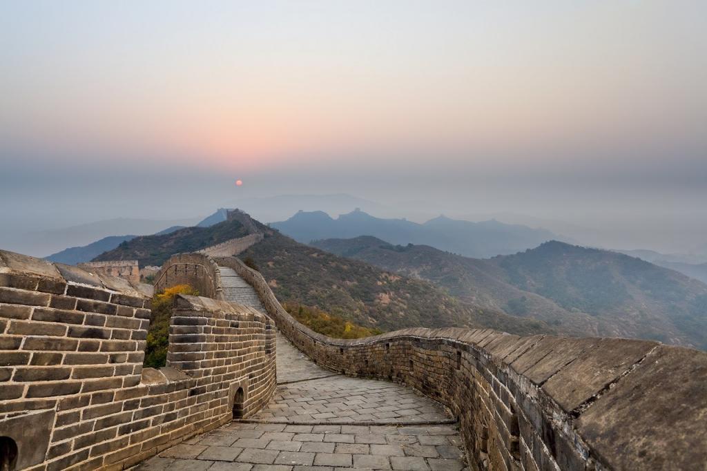 the great wall in ridge mountains at sunrise
