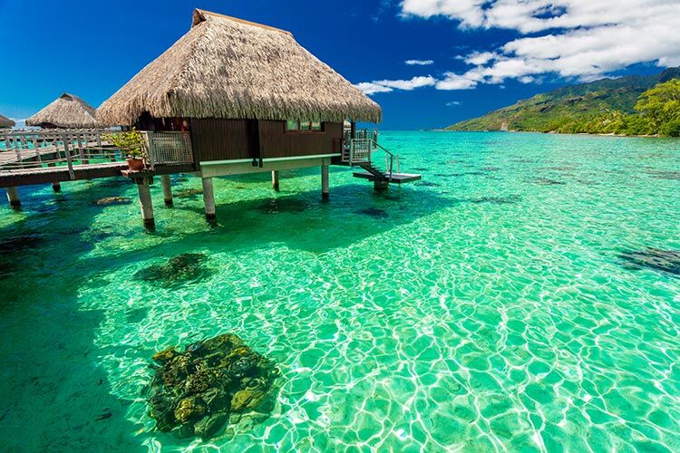 over-water-bungalows-and-green-lagoon-moorea-pulau-bora-bora