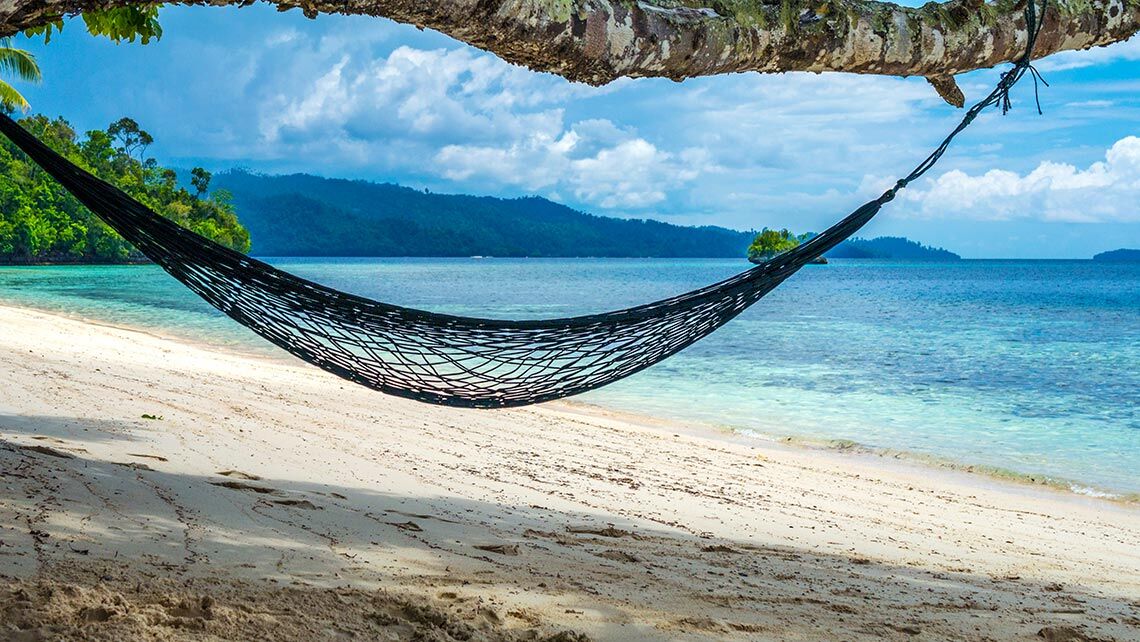 hammock-on-the-beach-batu-lima-coral-reef