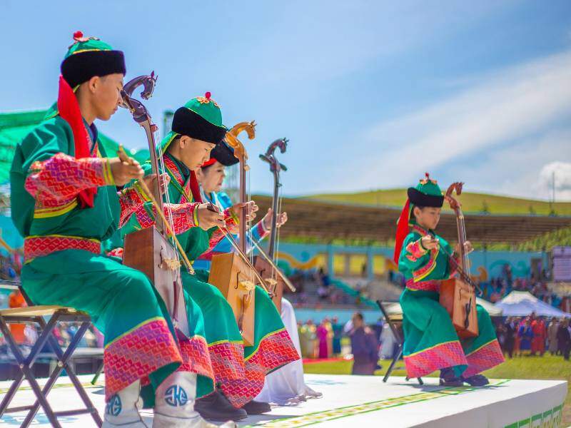 Traditional Mongolian Musicians Perform Outdoors